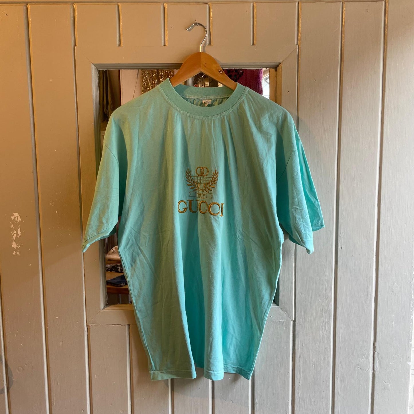 Vintage 80s/90s Turquoise Bootleg Embroidered T-shirt