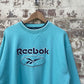 vintage 1990s Turquoise Blue Reebok Sweatshirt Jumper