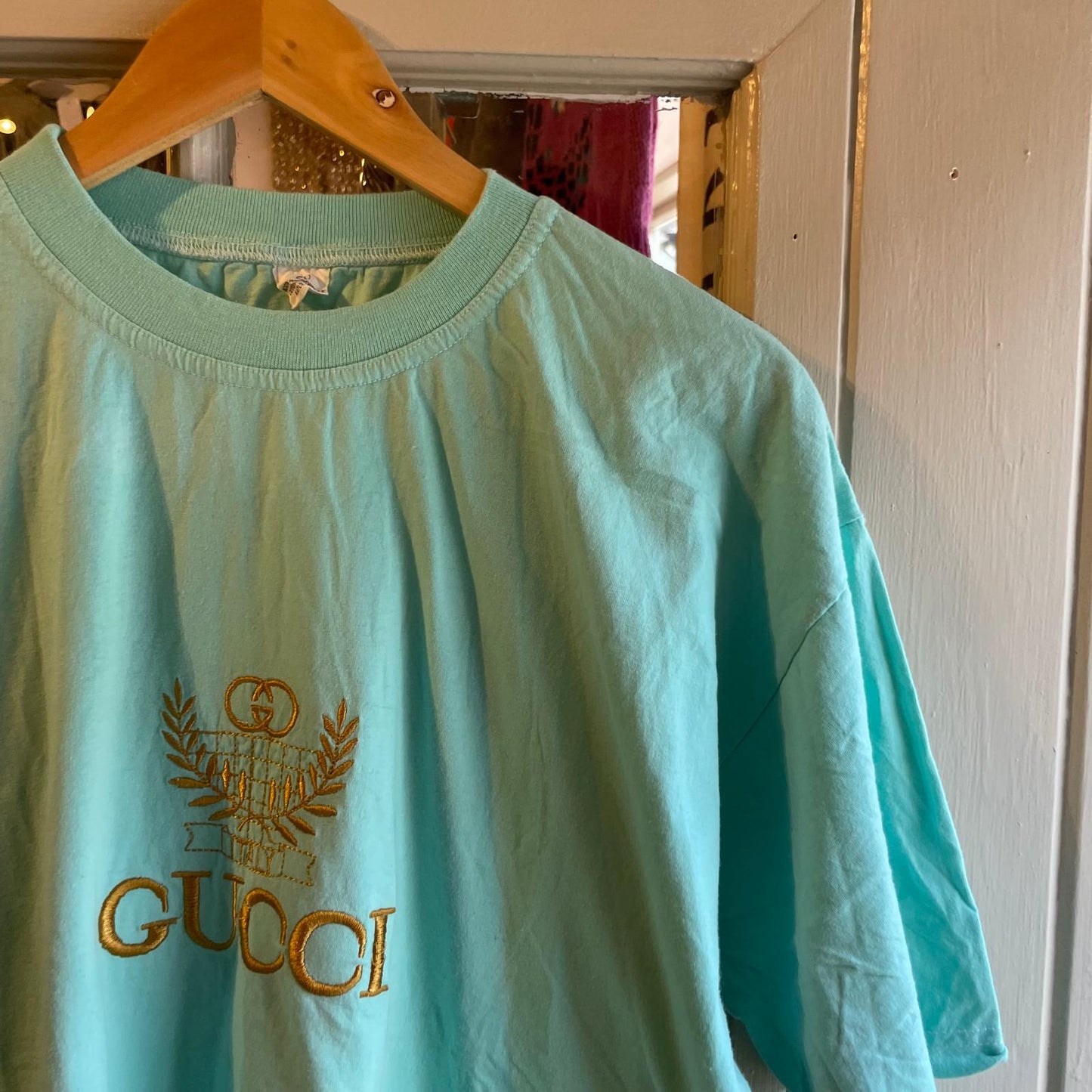 Vintage 80s/90s Turquoise Bootleg Embroidered T-shirt